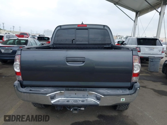 2015 Toyota Tacoma with VIN 3TMLU4EN8FM167337, listed as a IAAI auction lot 42117662 with 60,929 mi miles. Bid and sale history available at carsss.com. Image 16.
