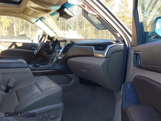 2019 Chevrolet Tahoe LT with VIN 1GNSCBKC8KR123828, listed as a IAAI auction lot 41256573 with 125,618 mi miles. Bid and sale history available at carsss.com. Image 5.