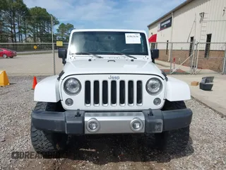 2017 Jeep Wrangler Unlimited Sahara with VIN 1C4BJWEG8HL734572, listed as a IAAI auction lot 41863636 with 123,979 mi miles. Bid and sale history available at carsss.com. Image 13.