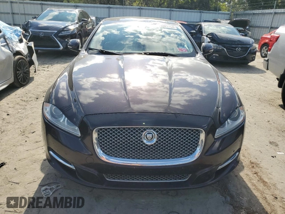 2013 Jaguar XJ z VIN SAJWA1C75D8V54004, wystawiony jako Copart lot #76922464 z przebiegiem 107 175 mil mil oraz Szkoda całkowita • Salvage title. Historia ofert i sprzedaży dostępna na DreamBid. Obrazek 5.