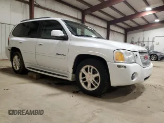 2007 GMC Envoy Denali with VIN 1GKET63M672302913, listed as a Copart auction lot 45098115 with 137,810 mi miles and Salvage Title. Bid and sale history available at carsss.com. Image 4.