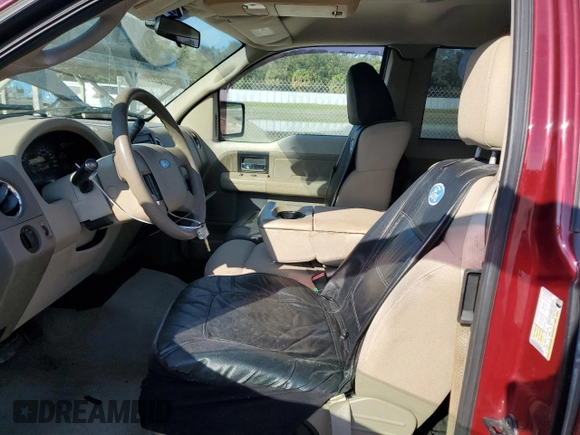 2005 Ford F-150 XLT with VIN 1FTPX02595KF03248, listed as a Copart auction lot 77145414 with 161,783 mi miles and Salvage Title. Bid and sale history available at carsss.com. Image 7.