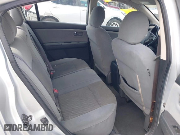 2012 Nissan Sentra S z VIN 3N1AB6AP7CL657434, wystawiony jako IAAI lot #42728376 z przebiegiem 150 930 mil mil oraz . Historia ofert i sprzedaży dostępna na DreamBid. Obrazek 8.