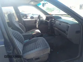 1993 Jeep Grand Cherokee Laredo с VIN 1J4GZ58S4PC130759, выставлен на аукционе IAAI как лот 35065976 с пробегом 184 071 миль миль и . История ставок и продаж доступна на DreamBid. Изображение 5.