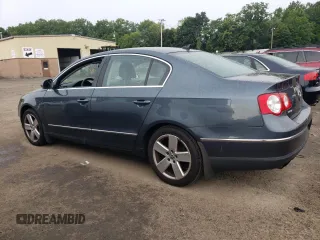 2009 Volkswagen Passat Komfort z VIN WVWJK73CX9P055380, wystawiony jako Copart lot #65812774 z przebiegiem 170 237 mil mil oraz Tytuł czysty. Historia ofert i sprzedaży dostępna na DreamBid. Obrazek 2.