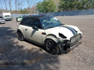 2013 MINI Convertible with VIN WMWZN3C58DT135598, listed as a IAAI auction lot 42122817 with 120,638 mi miles and . Bid and sale history available at DreamBid. Image 1.
