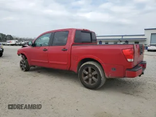 2012 Nissan Titan SV with VIN 1N6BA0EK4CN319941, listed as a Copart auction lot 43640705 with 210,885 mi miles and Salvage Title. Bid and sale history available at DreamBid. Image 2.