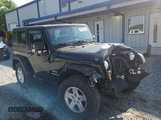 2012 Jeep Wrangler Sport with VIN 1C4AJWAG5CL273292, listed as a Copart auction lot 60135395 with 123,874 mi miles and Salvage title. Bid and sale history available at DreamBid. Image 14.