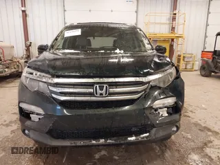 2016 Honda Pilot EX-L with VIN 5FNYF6H58GB012753, listed as a IAAI auction lot 41139479 with 175,842 mi miles and . Bid and sale history available at DreamBid. Image 12.