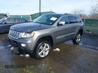 2013 Jeep Grand Cherokee Overland with VIN 1C4RJFCG8DC581719, listed as a IAAI auction lot 41566666 with 152,332 mi miles. Bid and sale history available at carsss.com. Image 17.