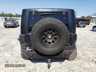 2013 Jeep Wrangler Unlimited Moab with VIN 1C4HJWEG7DL600043, listed as a Copart auction lot 52146945 with 118,882 mi miles and Salvage title. Bid and sale history available at DreamBid. Image 6.