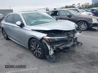 2022 Honda Civic EX with VIN 2HGFE1F73NH313912, listed as a IAAI auction lot 42389733 with 43,013 mi miles and . Bid and sale history available at DreamBid. Image 1.