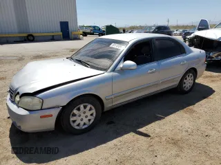 2006 Kia Optima LX z VIN KNAGD126665468978, wystawiony jako Copart lot #59178705 z przebiegiem 145 046 mil mil oraz Szkoda całkowita • Salvage title. Historia ofert i sprzedaży dostępna na DreamBid. Obrazek 1.