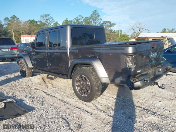 2023 Jeep Gladiator Overland with VIN 1C6HJTFG1PL546604, listed as a IAAI auction lot 41599632 with 23,108 mi miles. Bid and sale history available at carsss.com. Image 3.