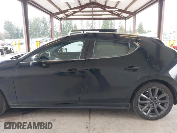 2019 Mazda Mazda3 Hatchback with VIN JM1BPBJM1K1134076, listed as a IAAI auction lot 41643876 with 69,641 mi miles. Bid and sale history available at carsss.com. Image 14.