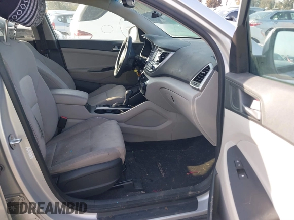 2016 Hyundai Tucson Sport with VIN KM8J33A20GU165154, listed as a IAAI auction lot 41611785 with Not Provided miles. Bid and sale history available at carsss.com. Image 5.