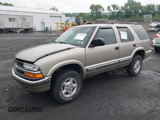 2000 Chevrolet Blazer LT with VIN 1GNDT13W9YK287456, listed as a IAAI auction lot 42450504 with 139,649 mi miles and . Bid and sale history available at DreamBid. Image 17.