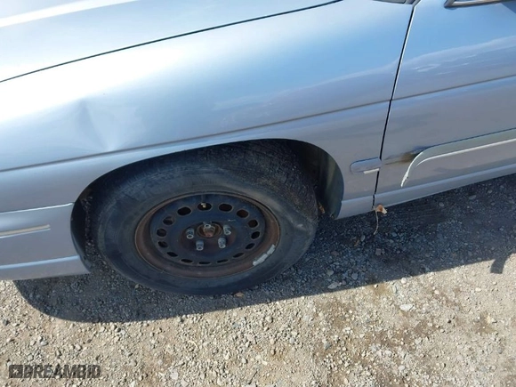1997 Chevrolet Lumina with VIN 2G1WL52M5V9216883, listed as a IAAI auction lot 41797511 with 231,779 mi miles. Bid and sale history available at carsss.com. Image 6.