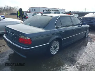 2001 BMW 7 Series 740iL with VIN WBAGH83491DP28749, listed as a IAAI auction lot 41440556 with 198,734 mi miles. Bid and sale history available at carsss.com. Image 4.