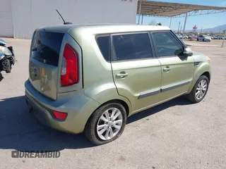 2012 Kia Soul + with VIN KNDJT2A64C7419796, listed as a IAAI auction lot 41883584 with 114,551 mi miles. Bid and sale history available at carsss.com. Image 4.