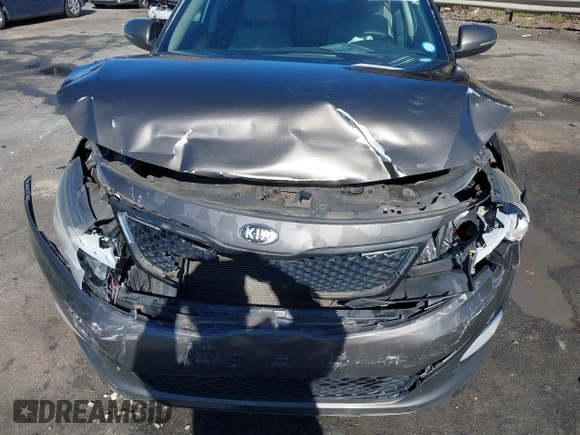 2014 Kia Optima EX z VIN 5XXGN4A78EG320367, wystawiony jako IAAI lot #41858824 z przebiegiem 216 987 mil mil oraz . Historia ofert i sprzedaży dostępna na DreamBid. Obrazek 6.