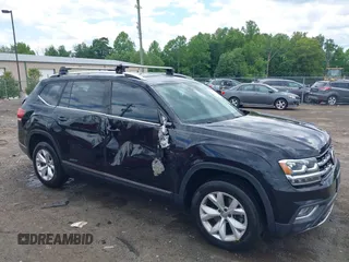 2018 Volkswagen Atlas SEL z VIN 1V2MR2CA2JC516351, wystawiony jako IAAI lot #42341113 z przebiegiem 135 077 mil mil oraz . Historia ofert i sprzedaży dostępna na DreamBid. Obrazek 1.