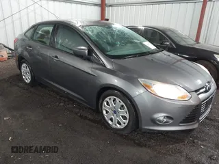 2012 Ford Focus SE with VIN 1FAHP3F21CL408430, listed as a IAAI auction lot 42286632 with 140,387 mi miles and . Bid and sale history available at DreamBid. Image 1.
