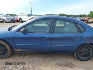 2004 Ford Taurus LX z VIN 1FAFP52U64A114884, wystawiony jako IAAI lot #42212573 z przebiegiem 106 402 mil mil oraz . Historia ofert i sprzedaży dostępna na DreamBid. Obrazek 14.