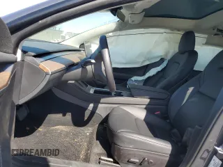 2023 Tesla Model 3 z VIN 5YJ3E1EA0PF407768, wystawiony jako Copart lot #45232555 z przebiegiem 8903 mil mil oraz Nie do naprawy. Historia ofert i sprzedaży dostępna na DreamBid. Obrazek 7.