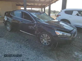 2014 Kia Cadenza Premium with VIN KNALN4D75E5163201, listed as a Copart auction lot 61553824 with 133,490 mi miles and Salvage Title. Bid and sale history available at carsss.com. Image 4.