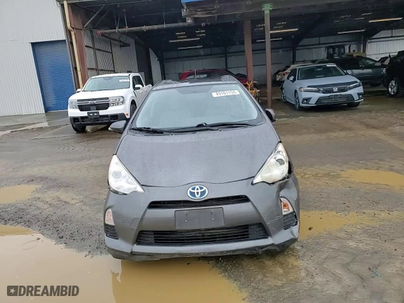 2013 Toyota Prius c One with VIN JTDKDTB31D1547574, listed as a Copart auction lot 49101155 with 131,732 mi miles and Salvage Title. Bid and sale history available at carsss.com. Image 11.