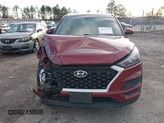 2019 Hyundai Tucson SE with VIN KM8J2CA49KU881841, listed as a IAAI auction lot 41099575 with 129,153 mi miles. Bid and sale history available at carsss.com. Image 12.