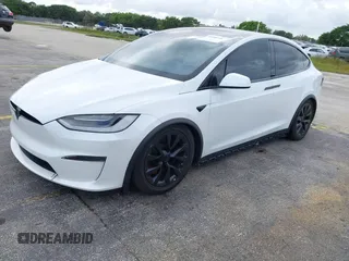 2022 Tesla Model X with VIN 7SAXCBE50NF359642, listed as a IAAI auction lot 41208766 with 37,749 mi miles. Bid and sale history available at carsss.com. Image 2.