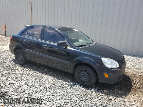 2009 Kia Rio LX with VIN KNADE223296539006, listed as a Copart auction lot 69229394 with 227,766 mi miles and Salvage Title. Bid and sale history available at DreamBid. Image 4.