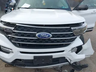 2020 Ford Explorer XLT with VIN 1FMSK8DH2LGC86989, listed as a IAAI auction lot 41078980 with 76,326 mi miles. Bid and sale history available at carsss.com. Image 6.