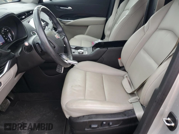 2021 Cadillac XT4 FWD Premium Luxury with VIN 1GYFZCR48MF083164, listed as a Copart auction lot 55377235 with 63,987 mi miles and Salvage title. Bid and sale history available at DreamBid. Image 7.