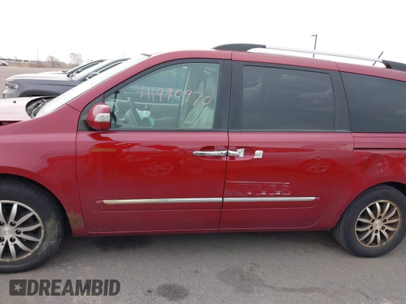 2012 Kia Sedona EX with VIN KNDMH4C76C6463143, listed as a IAAI auction lot 41990970 with 214,045 mi miles. Bid and sale history available at carsss.com. Image 14.
