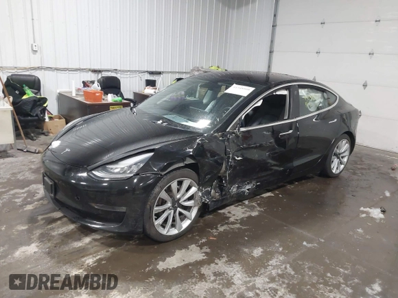 2018 Tesla Model 3 Long Range Battery with VIN 5YJ3E1EB7JF086778, listed as a IAAI auction lot 41348008 with 74,491 mi miles and . Bid and sale history available at DreamBid. Image 2.