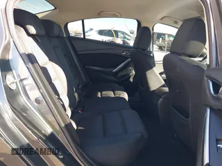 2016 Mazda 6 i Sport with VIN JM1GJ1U53G1400940, listed as a IAAI auction lot 41687400 with 77,737 mi miles and . Bid and sale history available at DreamBid. Image 8.