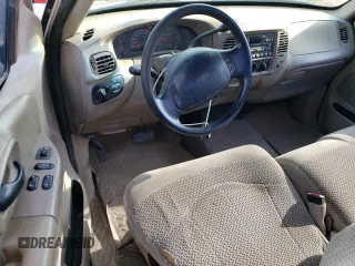 2000 Ford F-150 XL with VIN 1FTRF18L9YKA95457, listed as a Copart auction lot 67083164 with 97,988 mi miles and Salvage title. Bid and sale history available at DreamBid. Image 8.
