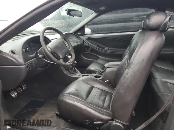 2003 Ford Mustang GT Deluxe with VIN 1FAFP42X33F380899, listed as a Copart auction lot 42158555 with 142,086 mi miles and Salvage Title. Bid and sale history available at carsss.com. Image 7.