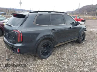 2024 Kia Telluride EX with VIN 5XYP3DGC0RG495708, listed as a IAAI auction lot 40970095 with 7,135 mi miles and . Bid and sale history available at carsss.com. Image 4.