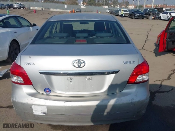 2010 Toyota Yaris with VIN JTDBT4K37A4076727, listed as a IAAI auction lot 41023533 with 102,494 mi miles. Bid and sale history available at carsss.com. Image 17.