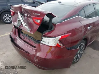 2016 Nissan Maxima SV with VIN 1N4AA6AP9GC410441, listed as a IAAI auction lot 41479069 with 74,252 mi miles and . Bid and sale history available at DreamBid. Image 18.