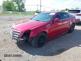 2010 Cadillac CTS with VIN 1G6DK5EV5A0113007, listed as a IAAI auction lot 42065282 with 228,694 mi miles and . Bid and sale history available at DreamBid. Image 2.