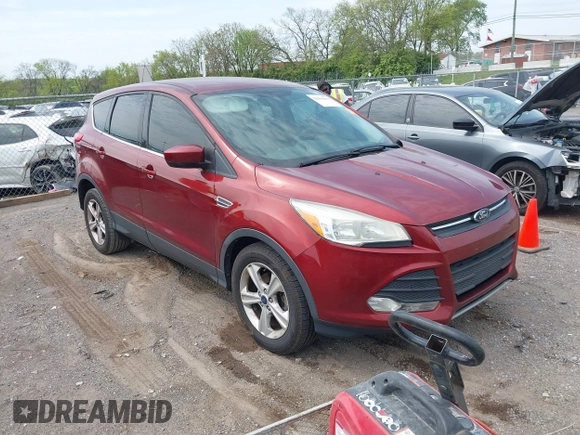 2014 Ford Escape SE with VIN 1FMCU0GX2EUB60526, listed as a IAAI auction lot 42060469 with 128,796 mi miles. Bid and sale history available at carsss.com. Image 1.
