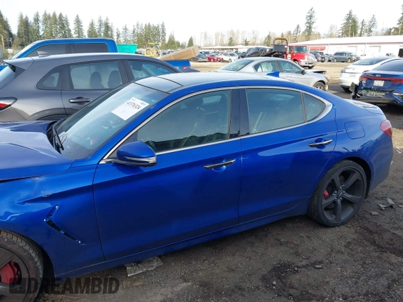 2020 Genesis G70 3.3T with VIN KMTG34LEXLU049127, listed as a IAAI auction lot 41376324 with 38,539 mi miles and . Bid and sale history available at DreamBid. Image 14.