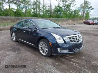 2013 Cadillac XTS Luxury with VIN 2G61P5S37D9167698, listed as a IAAI auction lot 41988234 with 71,103 mi miles. Bid and sale history available at carsss.com. Image 1.