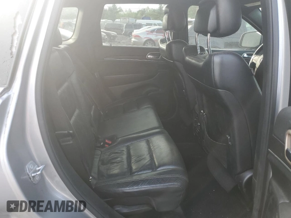 2014 Jeep Grand Cherokee Limited with VIN 1C4RJFBG8EC496303, listed as a Copart auction lot 56215195 with 129,269 mi miles and Salvage Title. Bid and sale history available at DreamBid. Image 11.