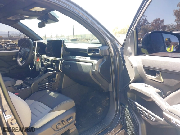2024 Toyota Tacoma 4WD SR5 with VIN 3TMLB5JN4RM039036, listed as a IAAI auction lot 41813562 with 2,112 mi miles. Bid and sale history available at carsss.com. Image 5.